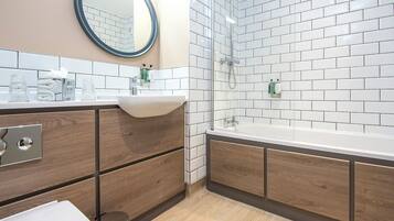Eco-friendly toiletries, hair dryer, towels, shampoo