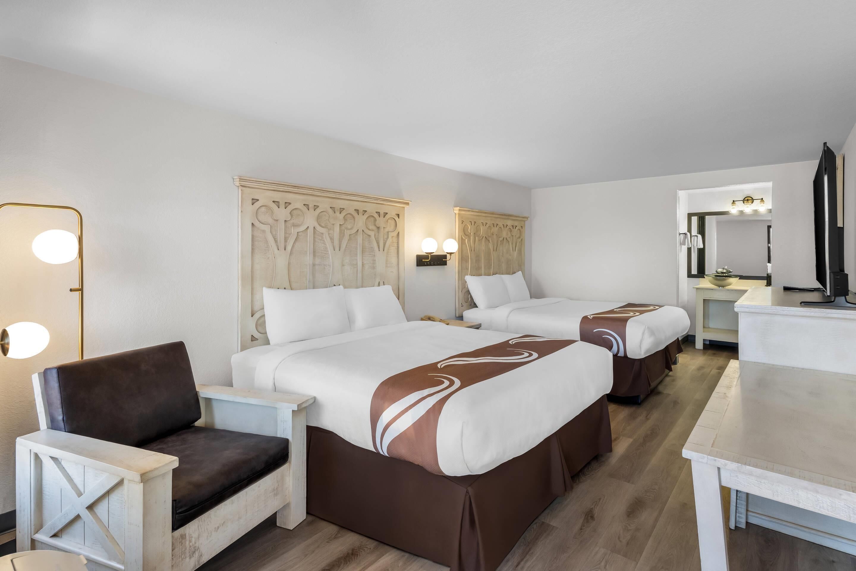 Premium bedding, down duvets, memory-foam beds, desk