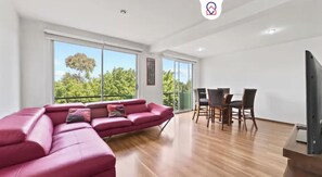 Comfort Apartment, City View | Living area | TV - Spacious Apt Near Centro Historico (Mexico City)