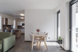 Design Apartment, 1 Bedroom, Non Smoking, Terrace | Living area | 32-inch TV with cable channels - River Apartments (Mlada Boleslav)