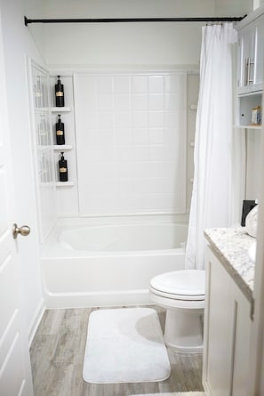 Jetted tub, hair dryer, towels, soap
