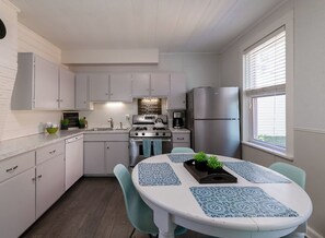 Fridge, microwave, oven, stovetop - Joyful Jeremy's Cottage on Madison - Near Downtown (Grand Haven)