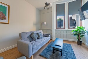 Luxury Apartment | Living area | 50-inch Smart TV with digital channels