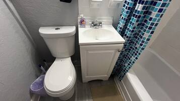 Hair dryer, towels, soap, shampoo