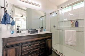 Shower, hair dryer, towels, soap