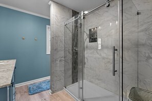 Shower, hair dryer, towels, soap