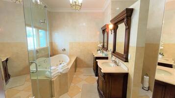 Shower, jetted tub, eco-friendly toiletries, hair dryer