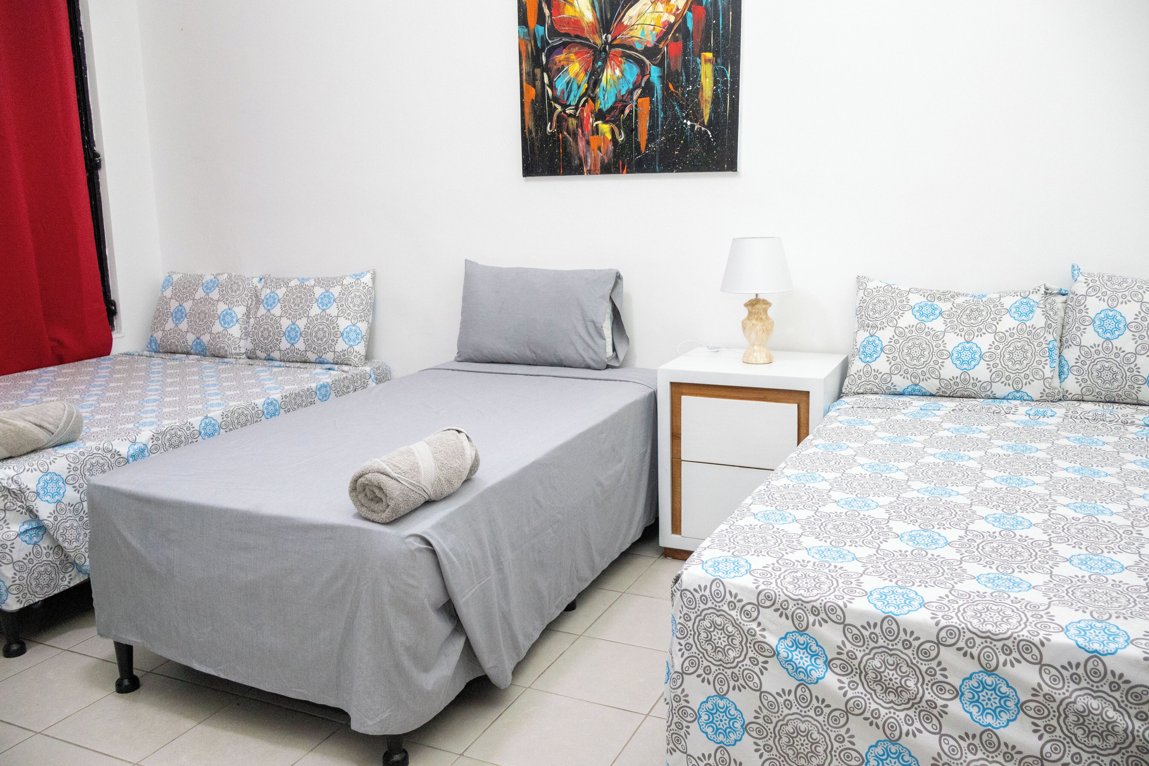Comfort Quadruple Room, 2 Double Beds, Non Smoking, Private Bathroom | Premium bedding, desk, laptop workspace, free WiFi