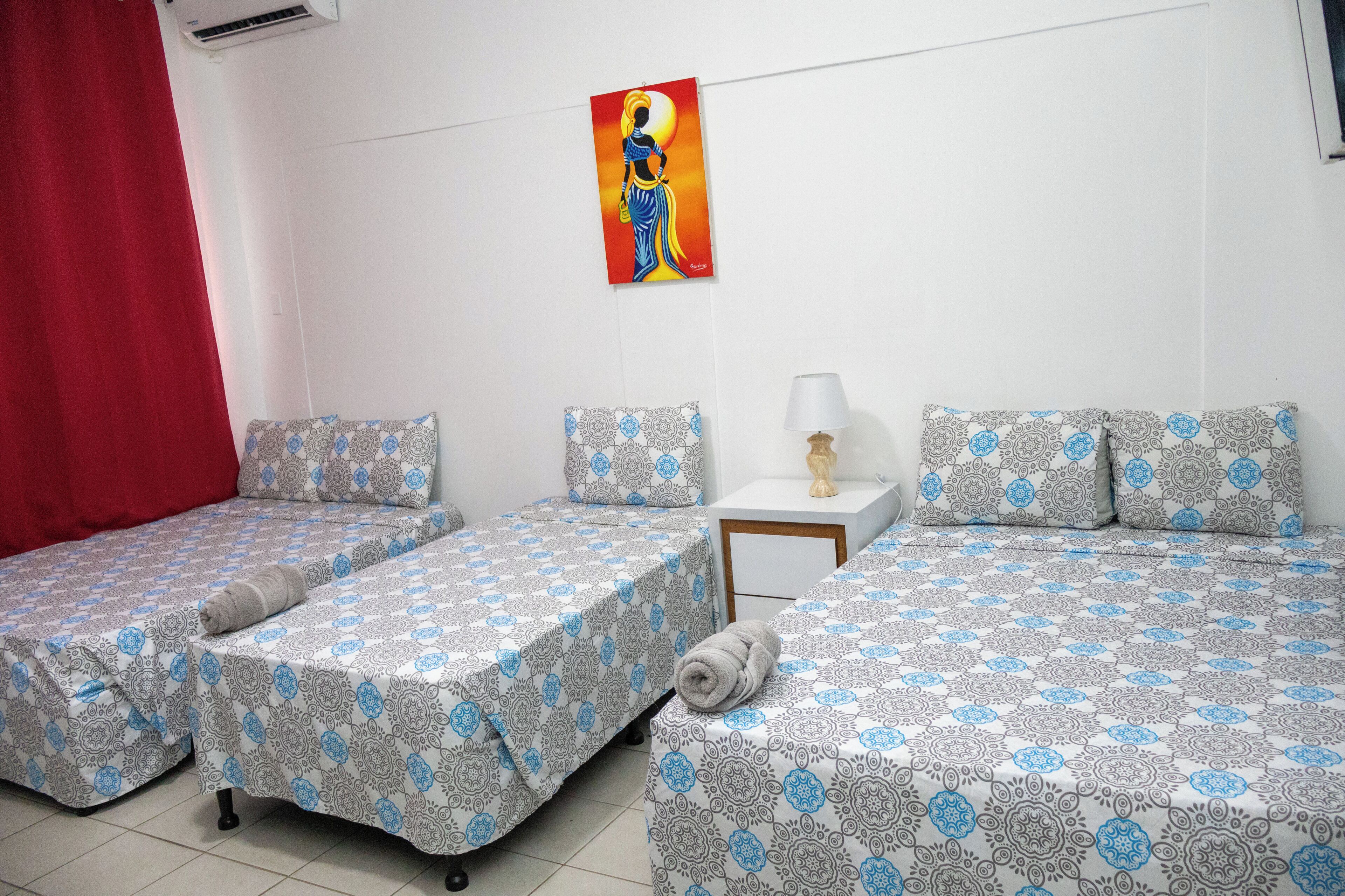 Comfort Quadruple Room, 2 Double Beds, Non Smoking, Private Bathroom | Premium bedding, desk, laptop workspace, free WiFi