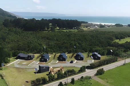 Cabaña, 2 habitaciones (05) | Exterior. Oceana Suites Curiñanco