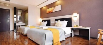 Orange Ke Chain Hotel (Chongqing Wanzhou Gaosuntang)