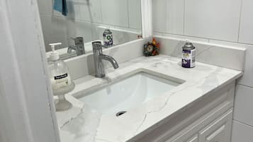 Hair dryer, towels, soap, shampoo