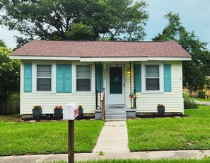 A single-story house with a front porch, a mailbox, and a number '3400' on the door. - Cozy Coastal Getaway – ½ Mile to Gulfport Beach (Gulfport)