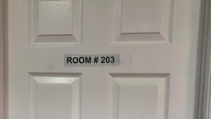 A white door with a sign reading "ROOM #203". - Shay-203-Cozy Holiday Room (Pickering)