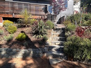 Garden area, steps to unit. 