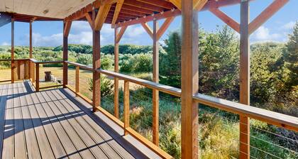 Family-friendly oceanview escape with spacious, wrap around deck and free Wifi
