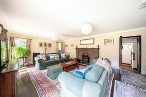 Cottage | Woonruimte | Een open haard