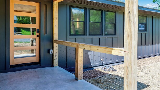 A modern building with a wooden door and large windows. - New Paltz Modern Zen Cabin (New Paltz)