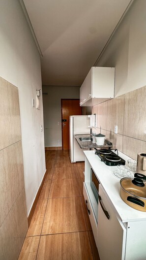 Suite | Private kitchen | Full-size fridge, microwave, stovetop, cookware/dishes/utensils