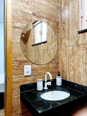 Shower, towels, soap, toilet paper