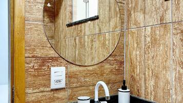 Shower, towels, soap, toilet paper