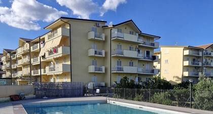 Spacious 2-Bed Apt in Calabria-with pool and AC, and 5 minutes walk to the beach