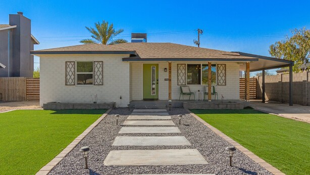 A single-story house with a green door, a covered porch, and a well-maintained lawn. - 14th Coronado Historic District Phoenix (Phoenix)