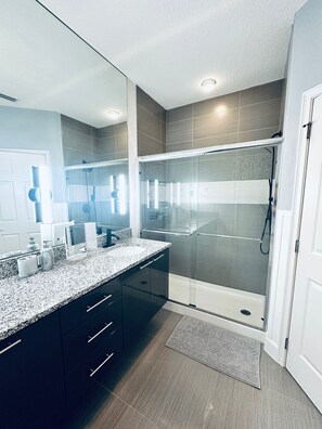 Shower, hair dryer, towels, soap