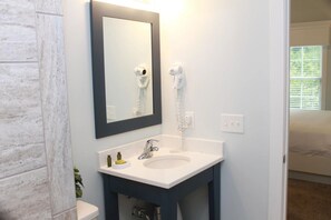 Jetted bath, hair dryer, towels, soap
