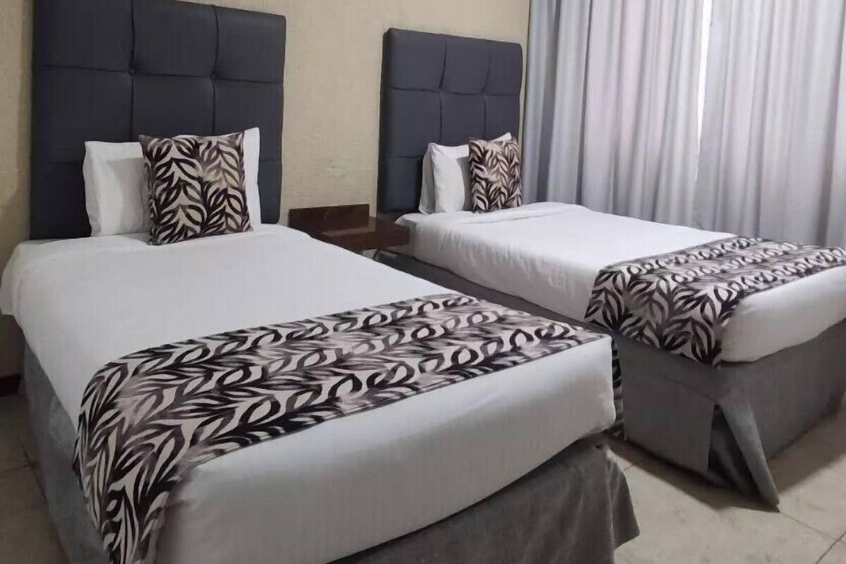 Basic Double or Twin Room | Desk, iron/ironing board (on request), WiFi (free), bed sheets