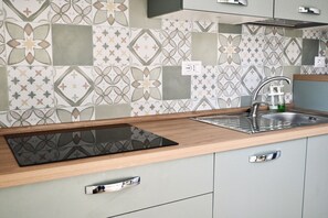 Fridge, oven, dining tables