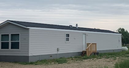 Cozy 3-bedroom mobile home in the Spring Creek Area just north of Pierre.