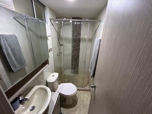 Shower, towels, soap, toilet paper