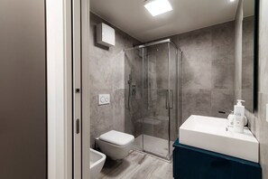 Shower, hair dryer, bidet, shampoo