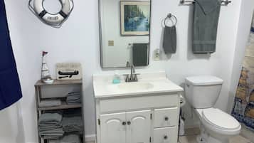 Jetted tub, hair dryer, towels, soap