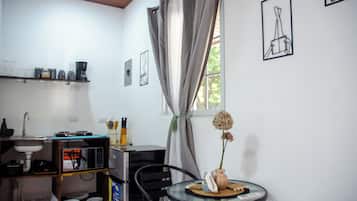 Fridge, microwave, stovetop, coffee/tea maker