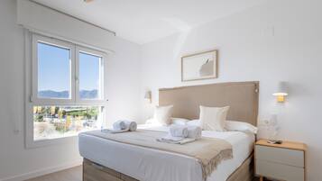 2 habitaciones, tabla de planchar con plancha y cuna de viaje