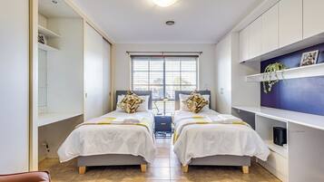 4 bedrooms, blackout curtains, iron/ironing board, free WiFi