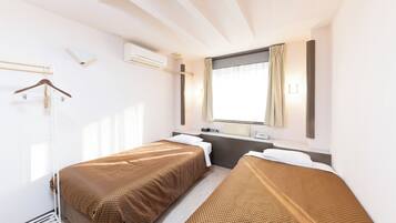 1 室のベッドルーム、デスク、WiFi (無料)、ベッドシーツ