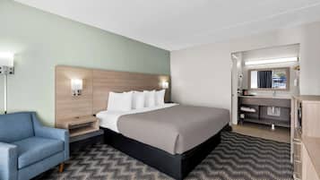 Quarto standard, 1 cama King, para não fumantes | Ferros/tábuas de passar roupa, Wi-Fi de cortesia, roupa de cama