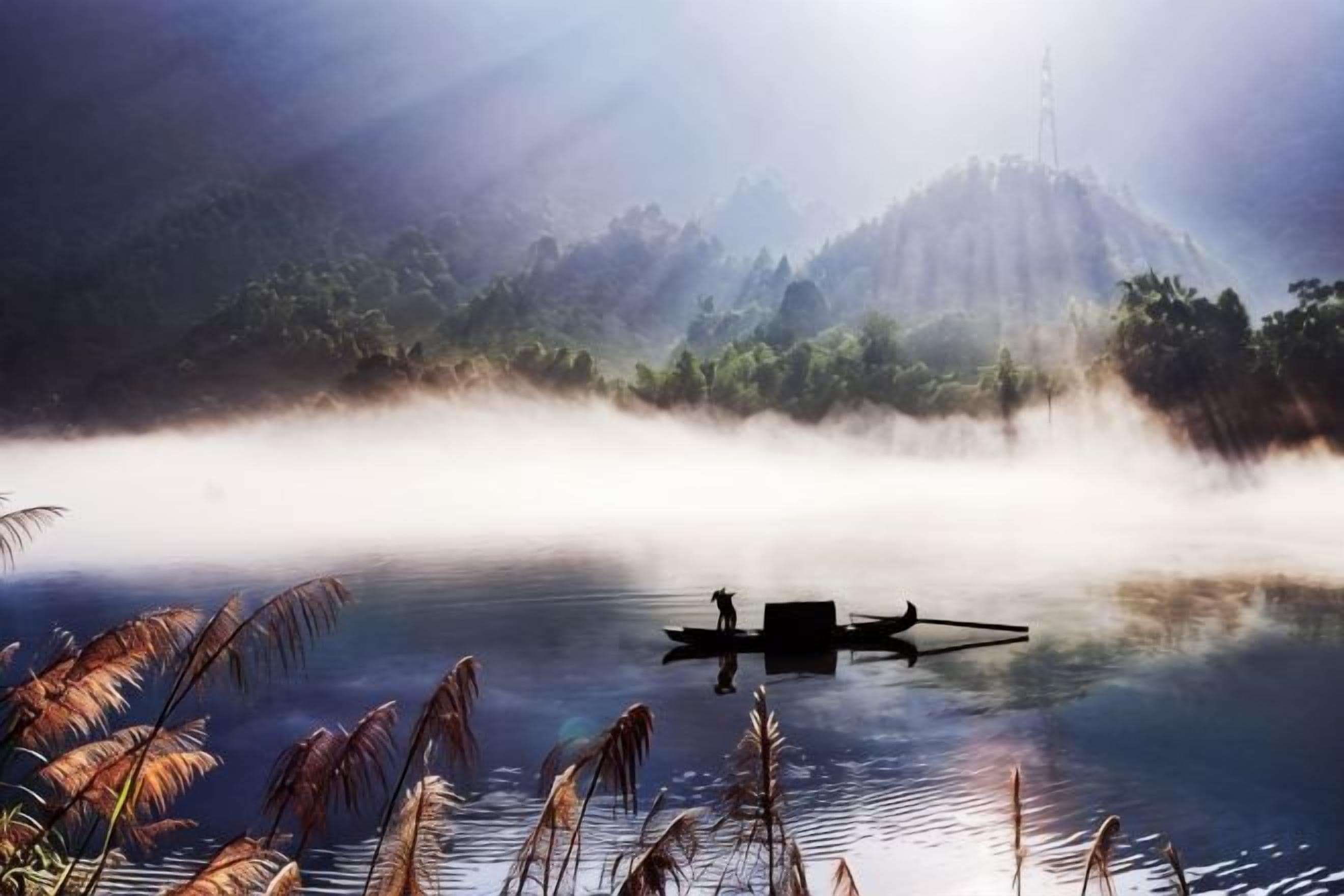 A serene lake with a misty forest backdrop and a boat.