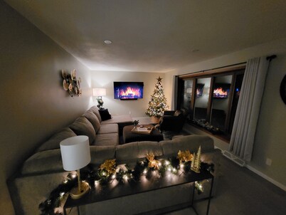 Spacious 4-bedroom house on 1 acre, fenced, GAME ROOM, and party tent rental!