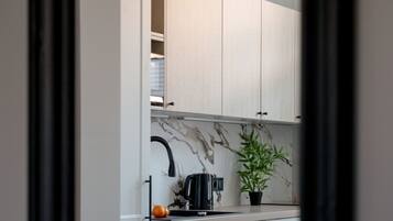 Microwave, dishwasher, cookware/dishes/utensils