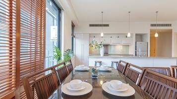 Family Suite, 2 Bedrooms, Balcony, City View | In-room dining