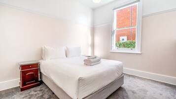 2 bedrooms, desk, iron/ironing board, travel cot