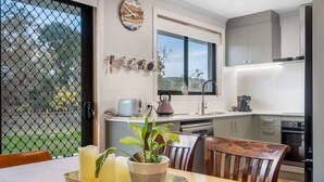 Coffee/tea maker, fridge, microwave, oven - Peaceful Beachside Home (Clifton Beach)