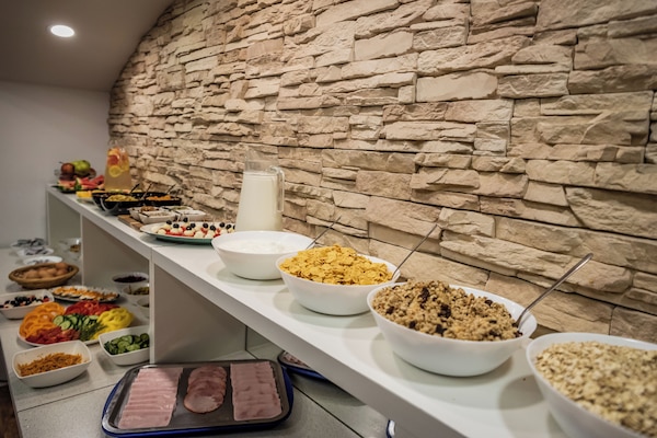 Daily buffet breakfast (EUR 10 per person)
