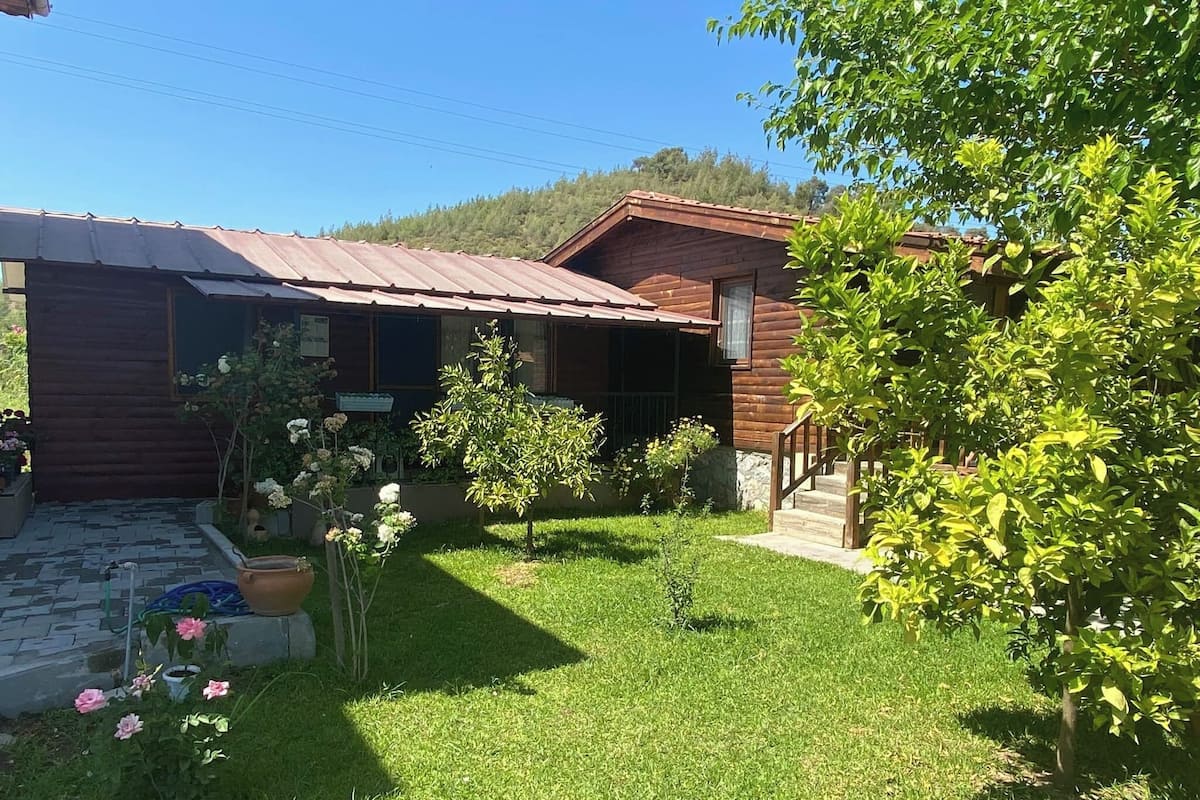 Cabana tradicional, 1 quarto, terraço, vista para o jardim | 1 quarto, individualmente decorados, individualmente mobiliados