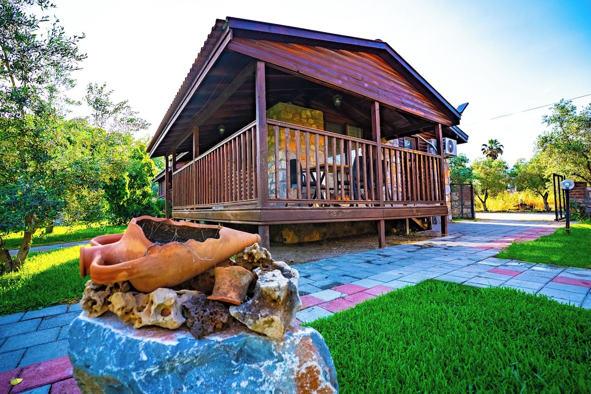 Cabana tradicional, 2 quartos, terraço, vista para o jardim | 1 quarto, individualmente decorados, individualmente mobiliados