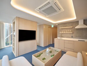 Family City Suite | Living area | 55-inch LED TV with cable channels, Netflix, streaming services - UH Suite The Gangnam (Seoul)